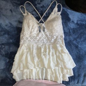 Originally bought from a boutique and has only been worn once. No stains.